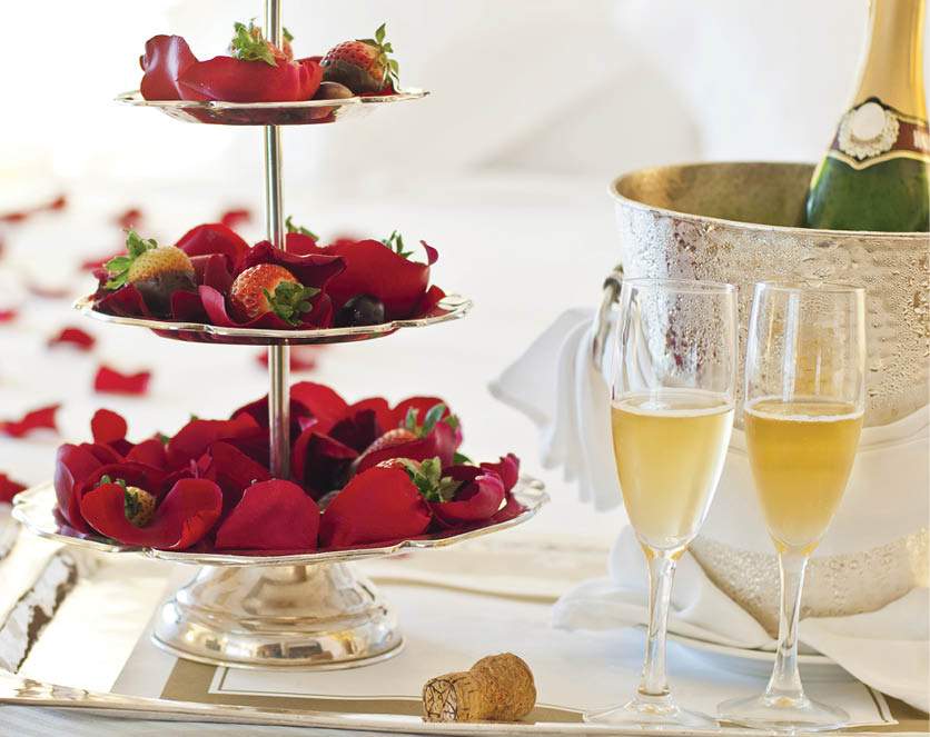 Beautiful honeymoon suite with chocolate strawberries and a bottle of champagne