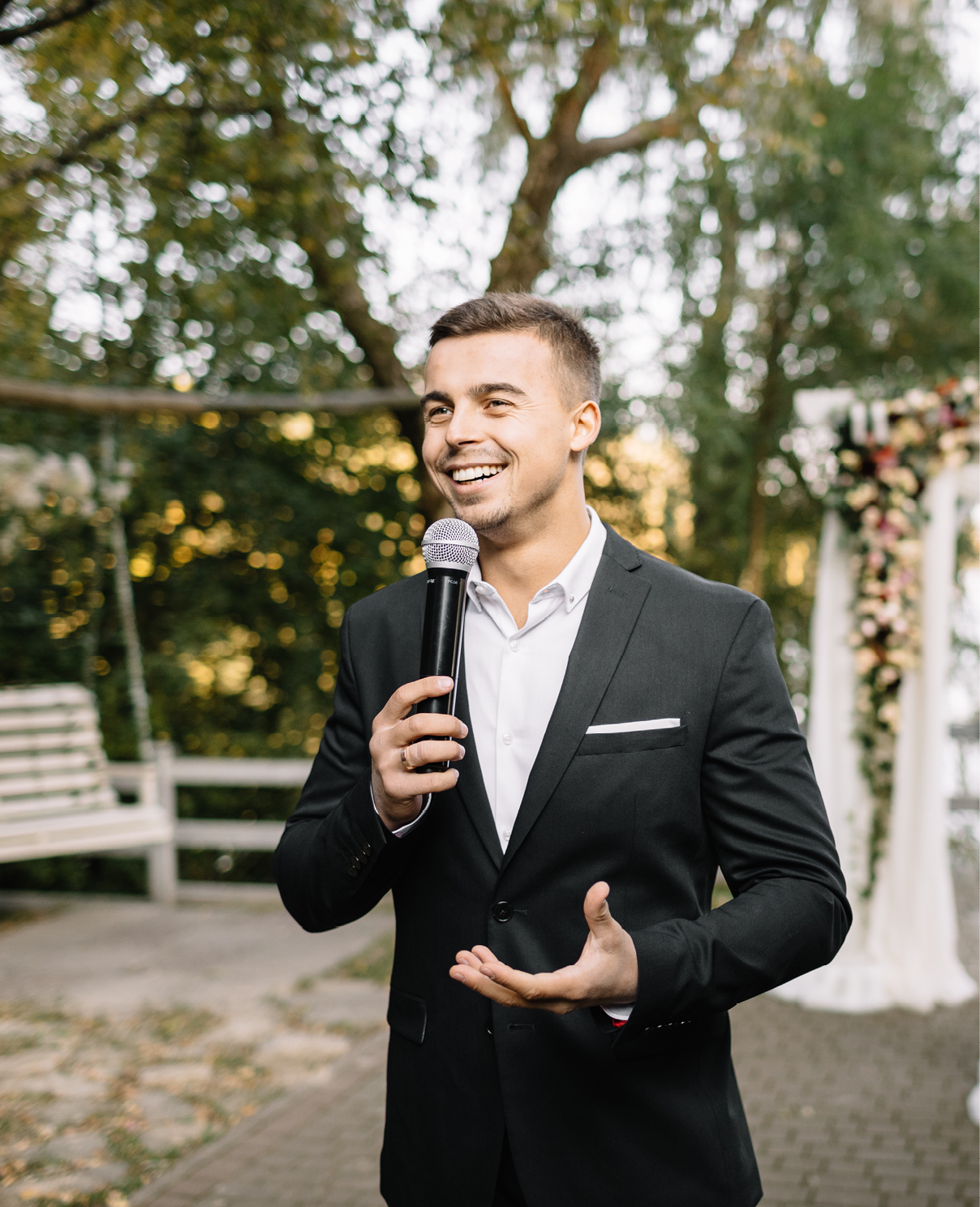 Elegant man with a microphone talking speech