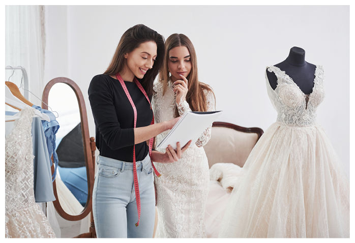 This will be awesome on you  The process of fitting the dress in the studio of hand crafted clothes 