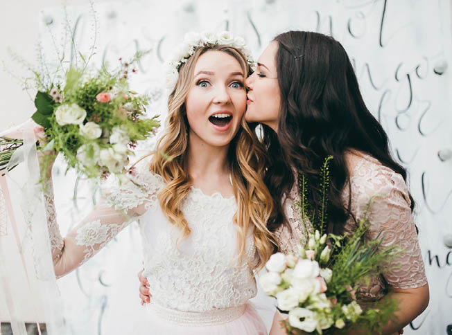 Pretty bride with her bridesmaids 