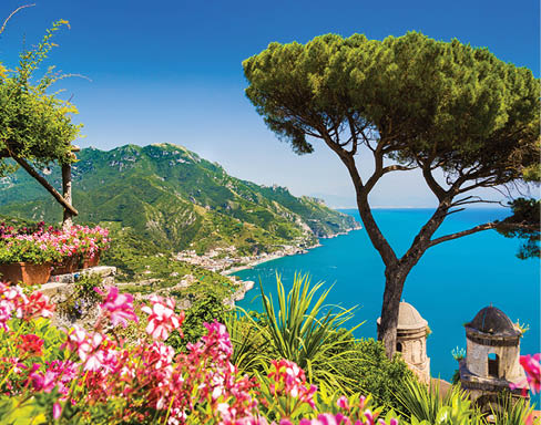 Scenic picture-postcard view of famous Amalfi Coast with Gulf of Salerno from Villa Rufolo gardens in Ravello, Campania, Italy