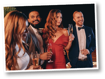 Group of beautiful people in formalwear communicating and smiling while spending time on luxury party