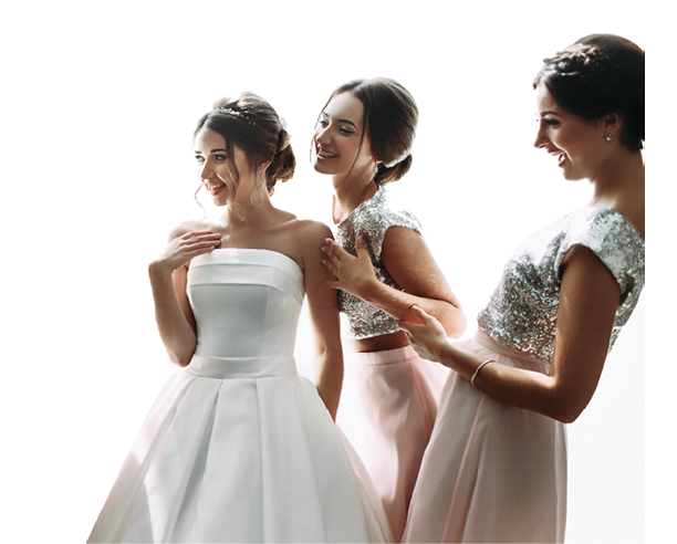 Beautiful bride & bridesmaids posing near window, wedding preparation