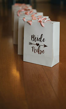 San Jose, CA - June 1, 2019: Bride Tribe paper bags as gift for bridal party bridesmaids  