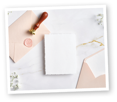 Wedding stationery set on marble desk top view  Blank paper card mockup, pastel pink envelopes with wax seal stamp, gypsophila flowers 