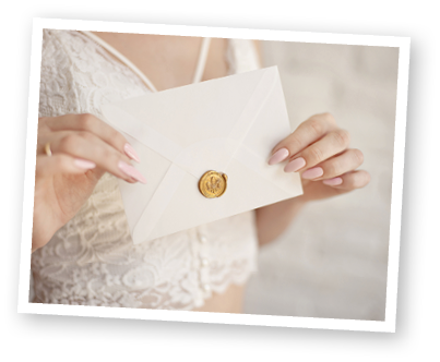 close-up woman with slim body holding invitation envelope card in hands, rear veaw 