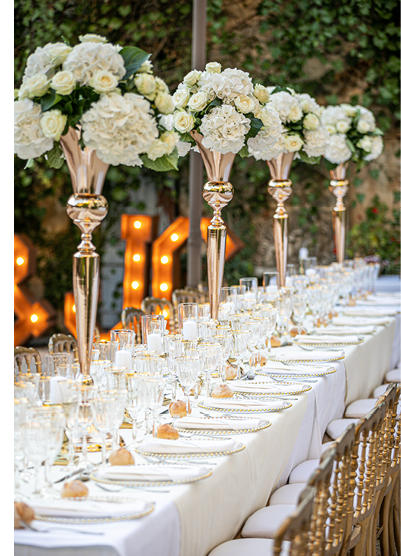 Luxurious wedding table white and golden with flowers