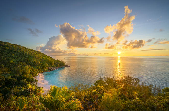 beautiful sunset at tropical beach anse georgette on praslin on the seychelles