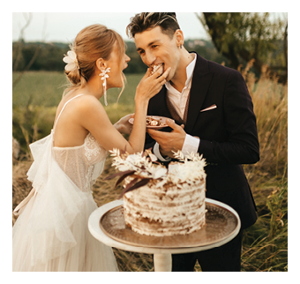 Wedding traditions, newlyweds eat wedding cake. High quality photo