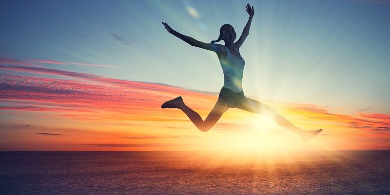 sunset woman jumping