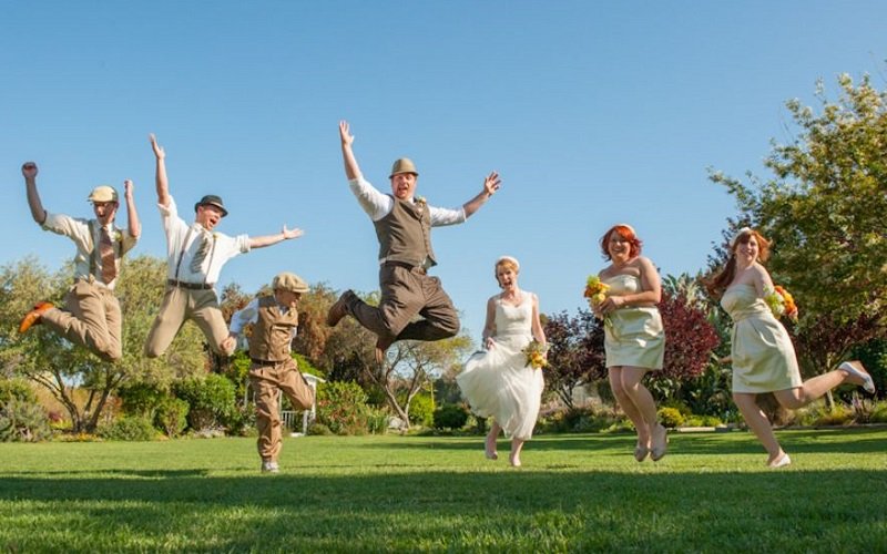 bridal party jumping