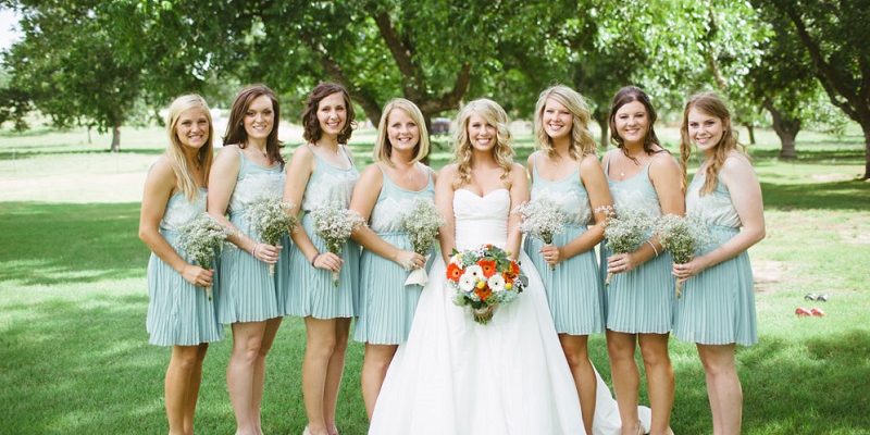 bride and bridesmaids in short dresses