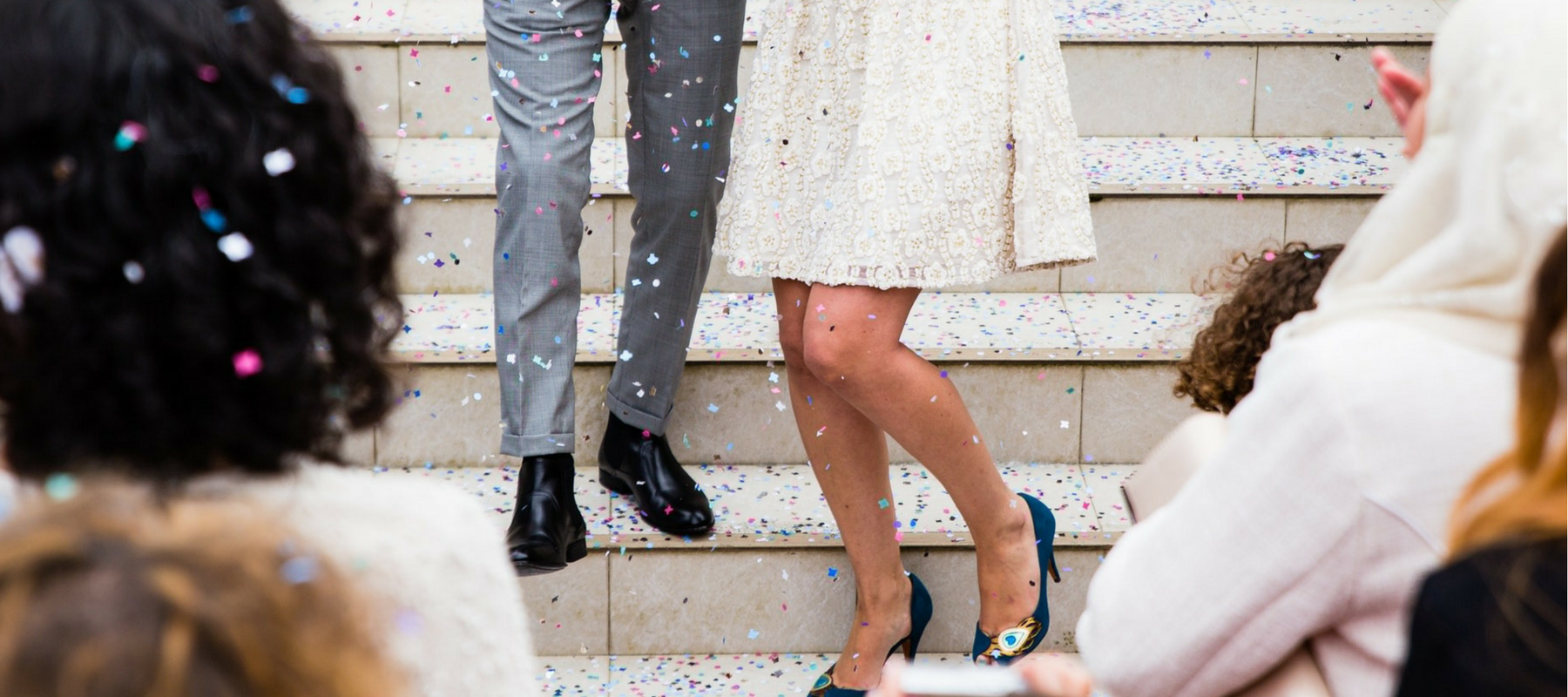 bride and groom on steps