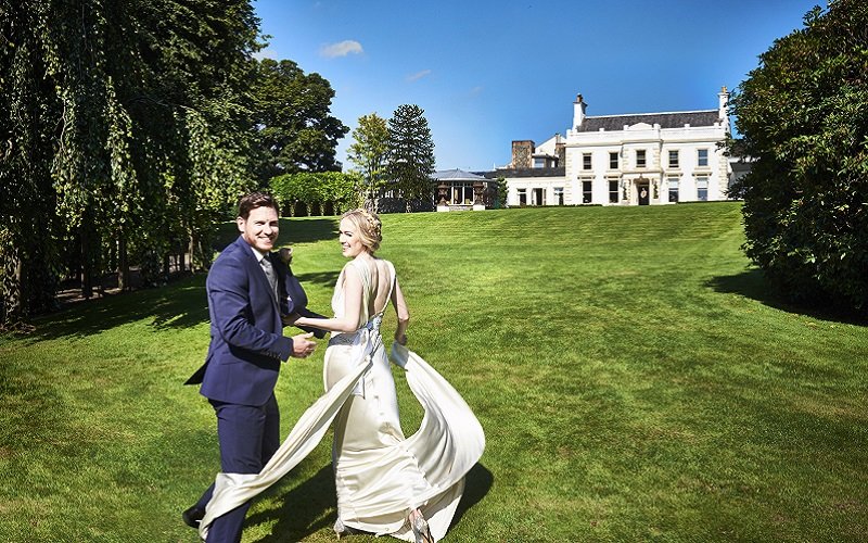 bride and groom in front of Galgorm 2