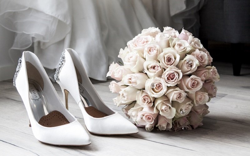 bridal shoes and bouquet