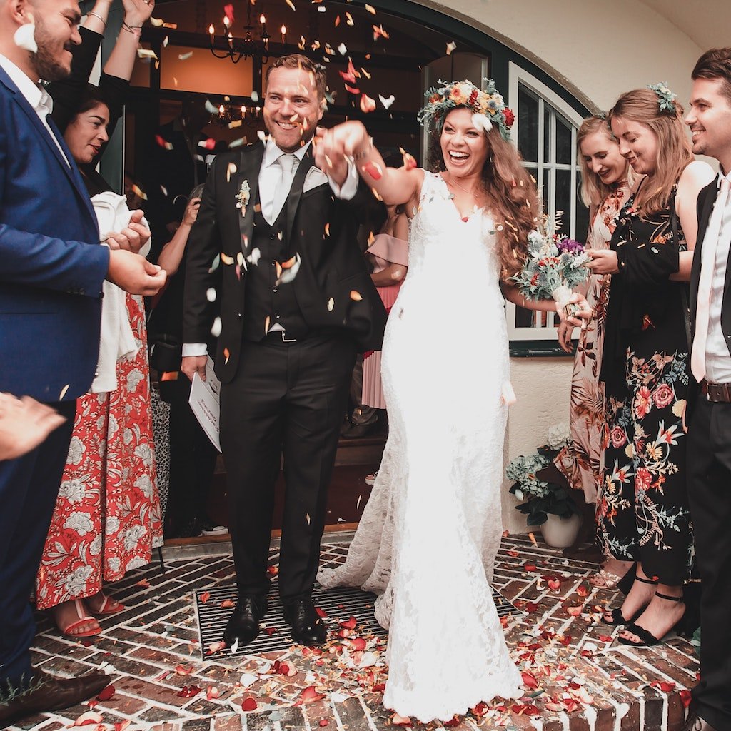 Couple with wedding guests