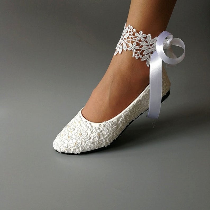 white flat dress shoes