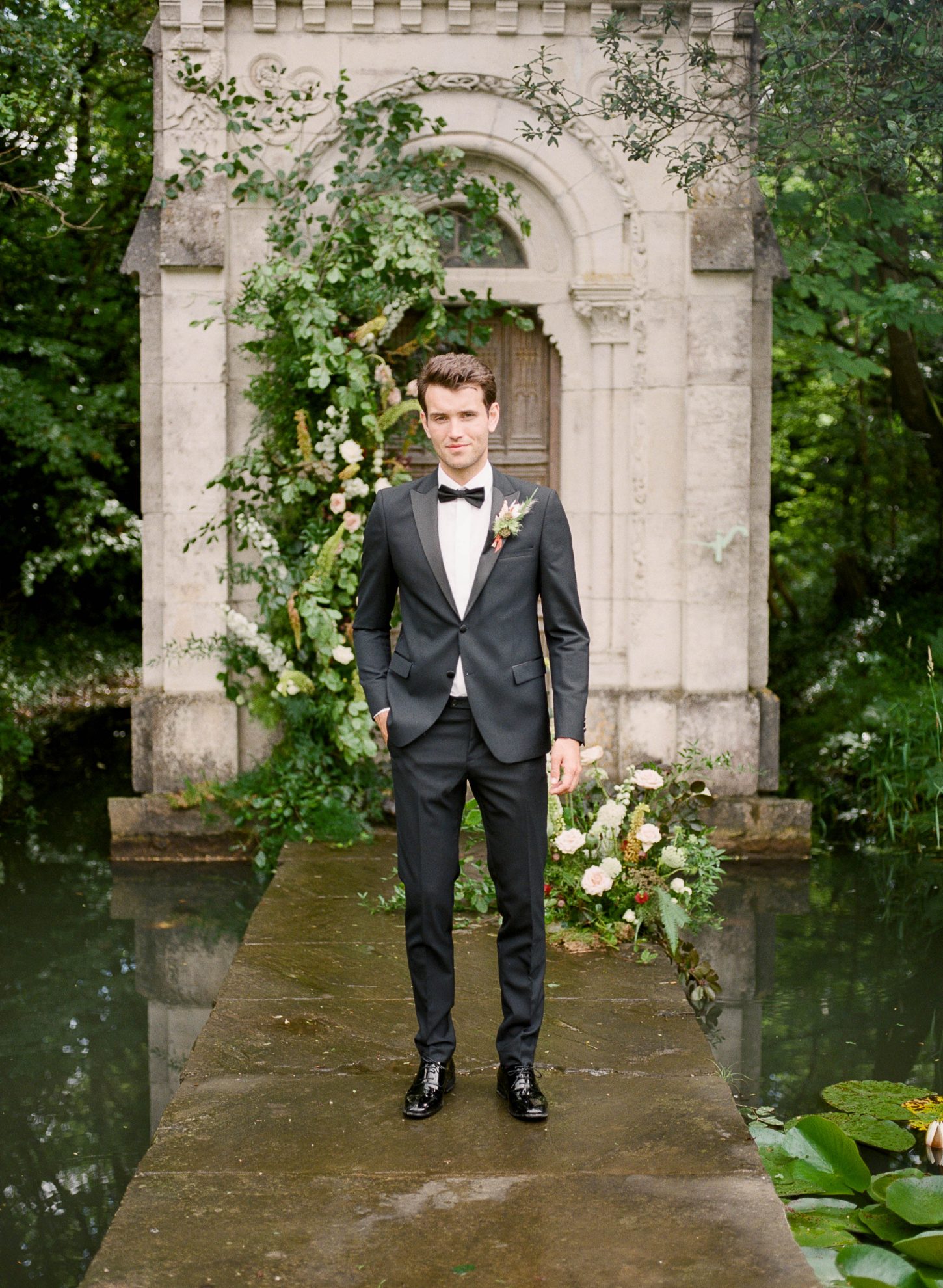 Fairytale wedding attire - groom in smart tuxedo